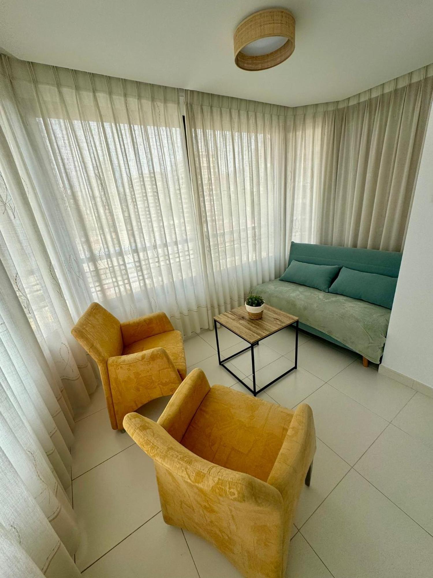 Apartamentos Coastal Haven 貝尼多姆 外观 照片